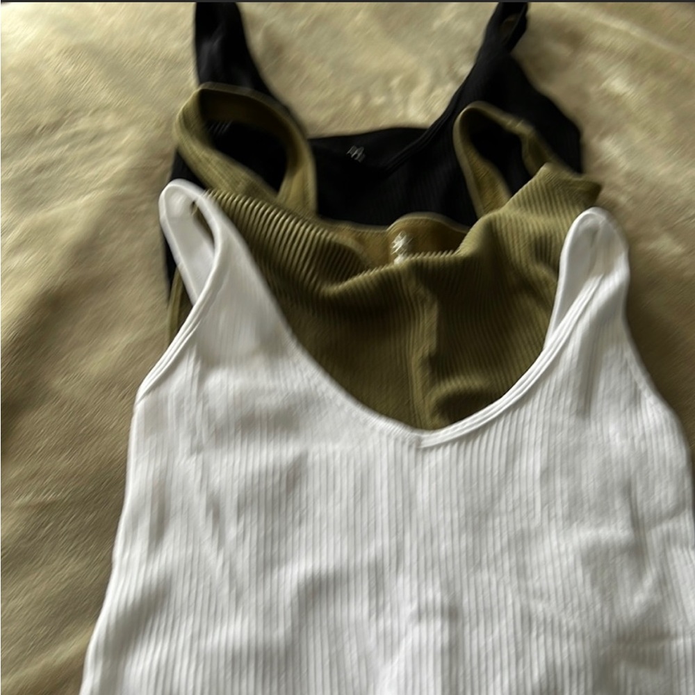 NWOT Set of 3 Aura Bodysuits.